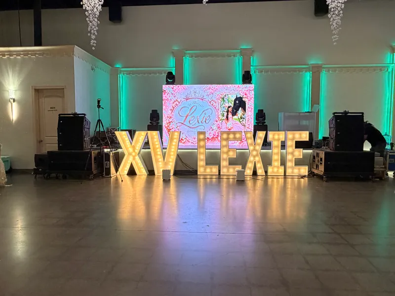 DJ Oso's sound, uplighting, and monogram screen setup at Lexie's quinceañera in Dallas-Fort Worth