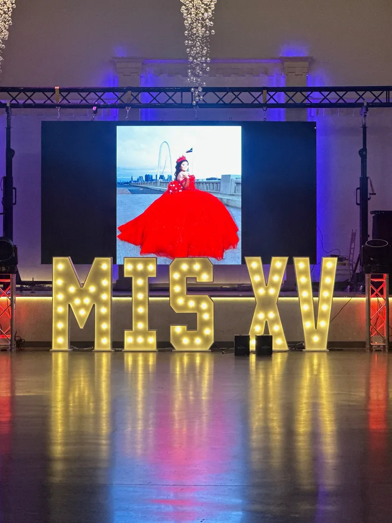 DJ Oso quinceañera production with LED video wall and light-up marquee letters in Dallas-Fort Worth