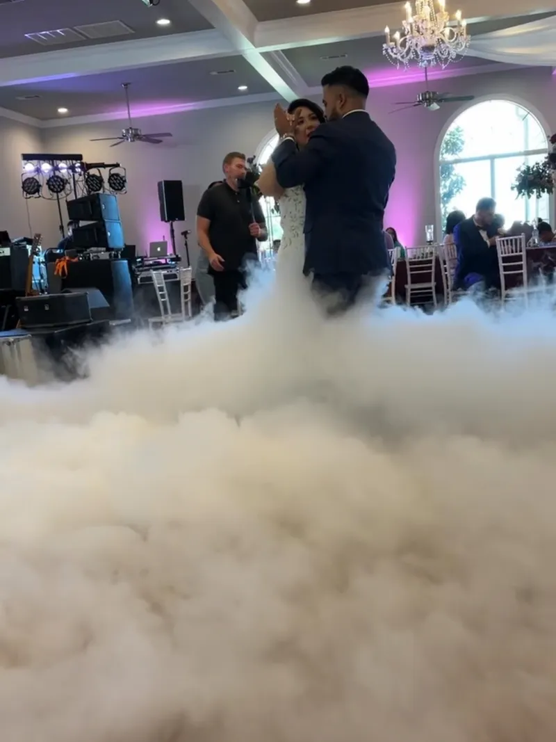 Bride and groom's Dance on the Clouds first dance at a Dallas-Fort Worth wedding by DJ Oso